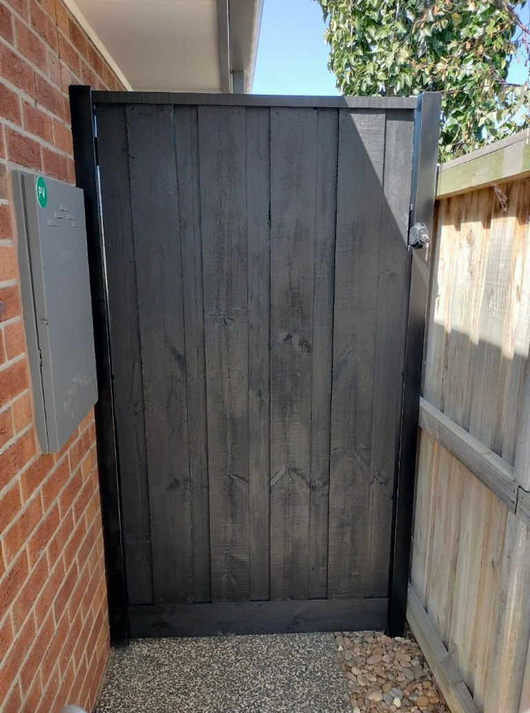 Tall treated pine, painted in black
