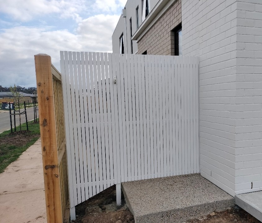 All white, steel and cladding, even has a white latch
